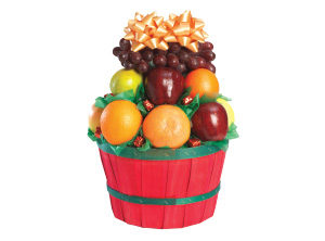 red basket with an array of fruit from stauffers fresh foods
