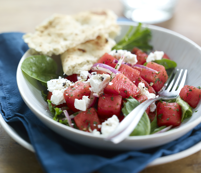 single serving of watermelon and feta salad in dish
