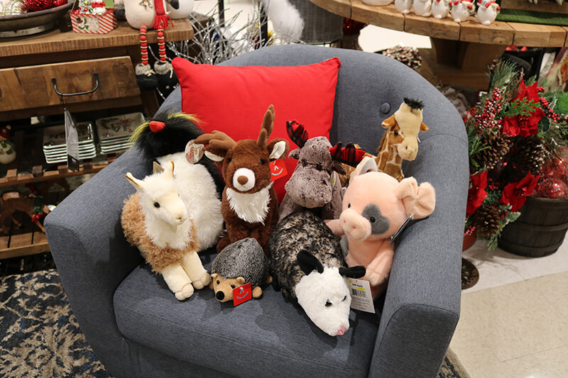 stuffed animals on chair
