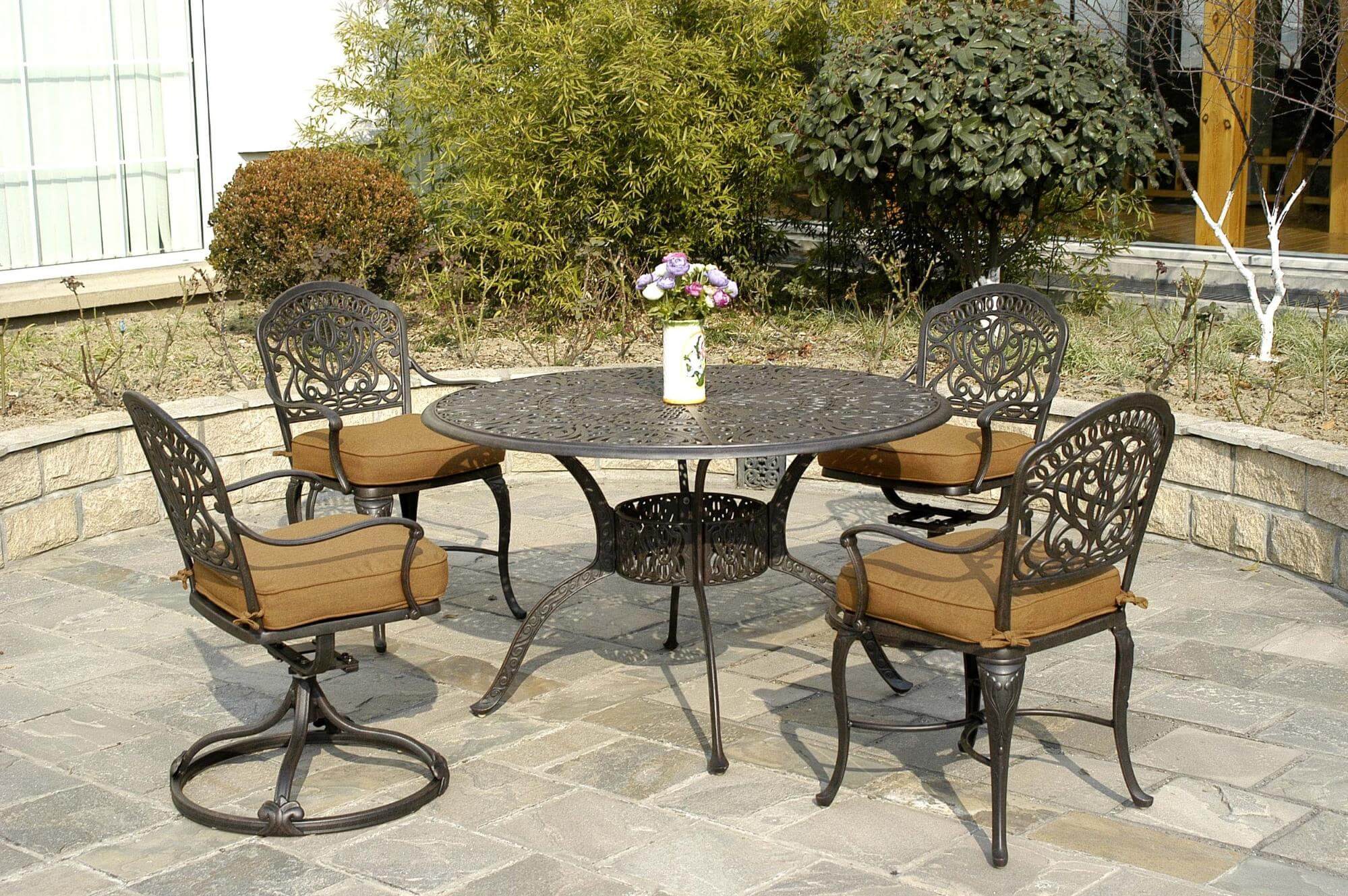 A quaint patio set fills the small space nicely without being overpowering. 