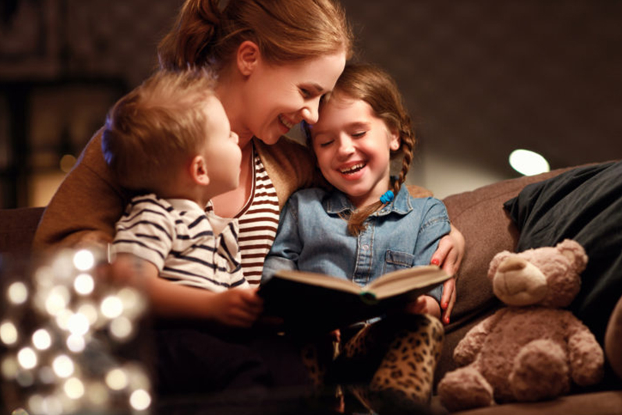 family reading a book