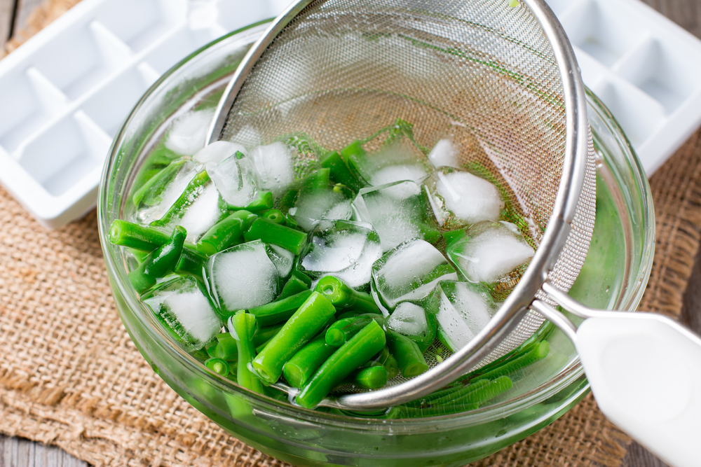 Blanching vegetables will help them retain their flavor and texture in the freezer.