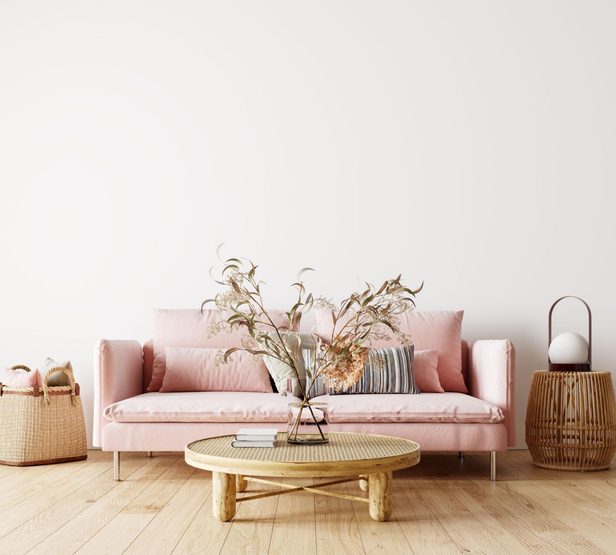 This pale pink couch demonstrates one of our favorite unconventional fall home decor trends: blush!