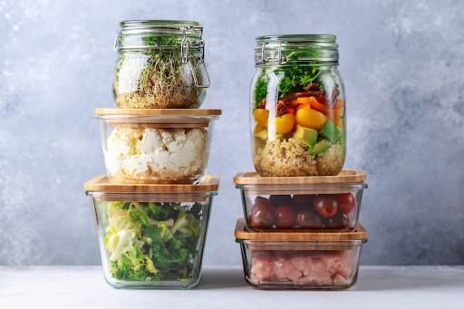 Road trip snacks packed in glass containers.