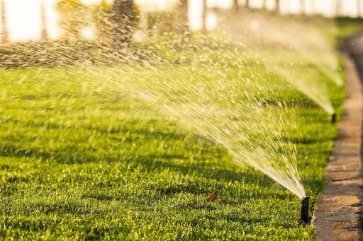 Sprinkler system watering lawn 
