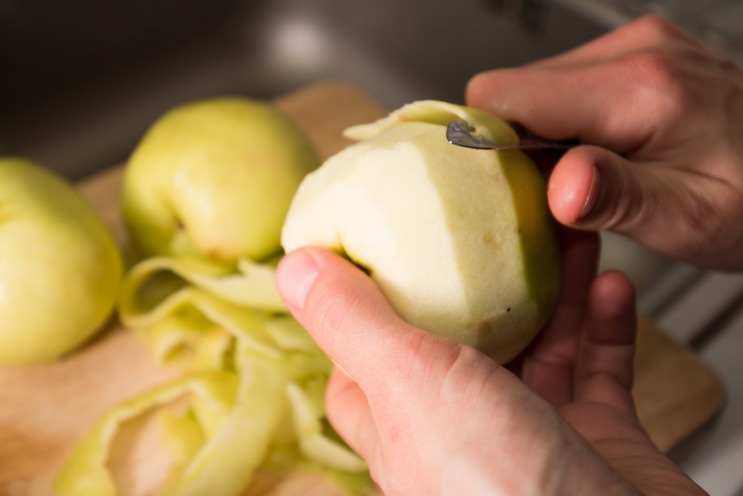 Peeling apples.