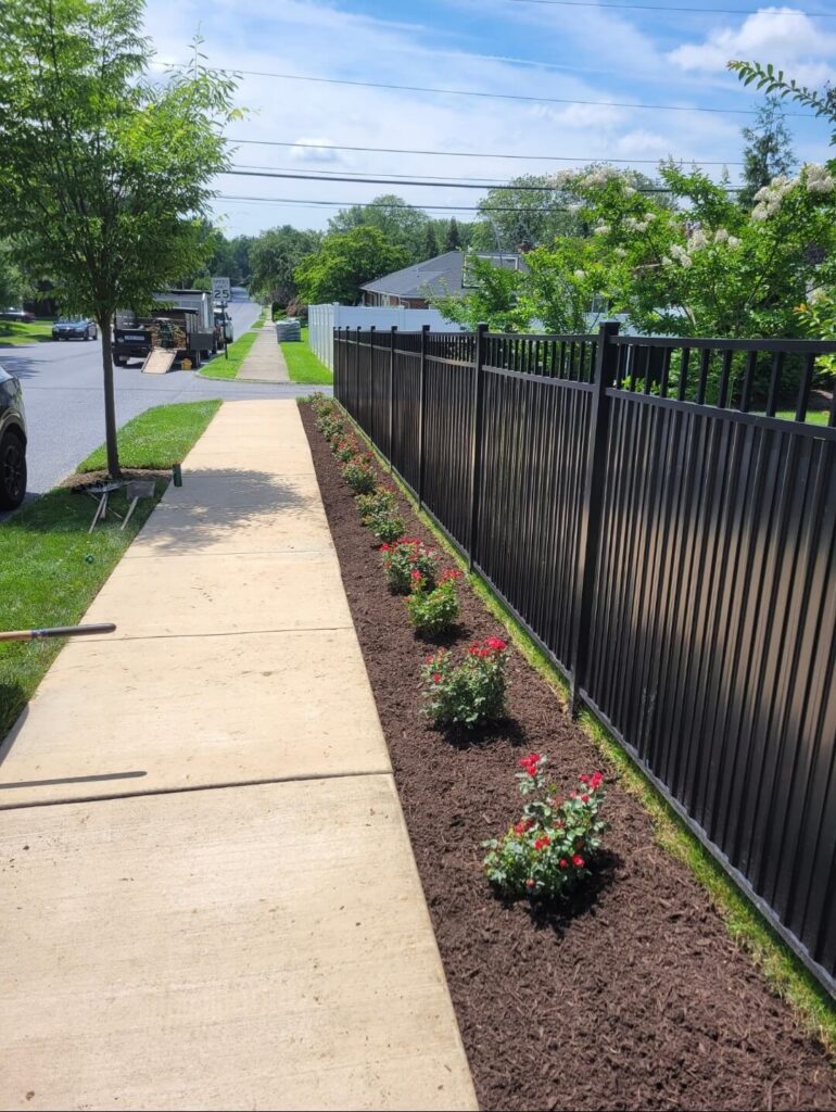 Fresh mulch along a fence in Lancaster, PA