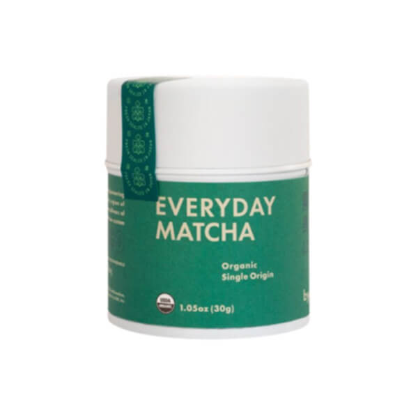 A white and green can of everyday matcha powder