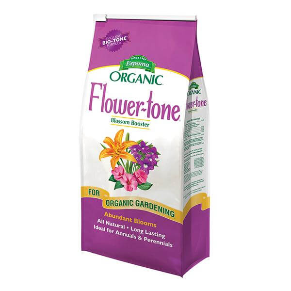 White and pink bag of Espoma flower tone fall planting fertilizer